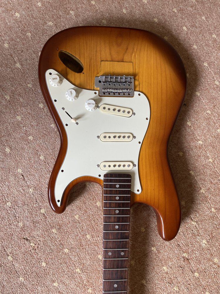 Finished sunburst guitar body