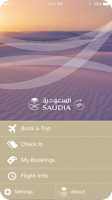 Old home: a dusk photograph of desert dunes behind the Saudia logo and a list of features in thin white type.